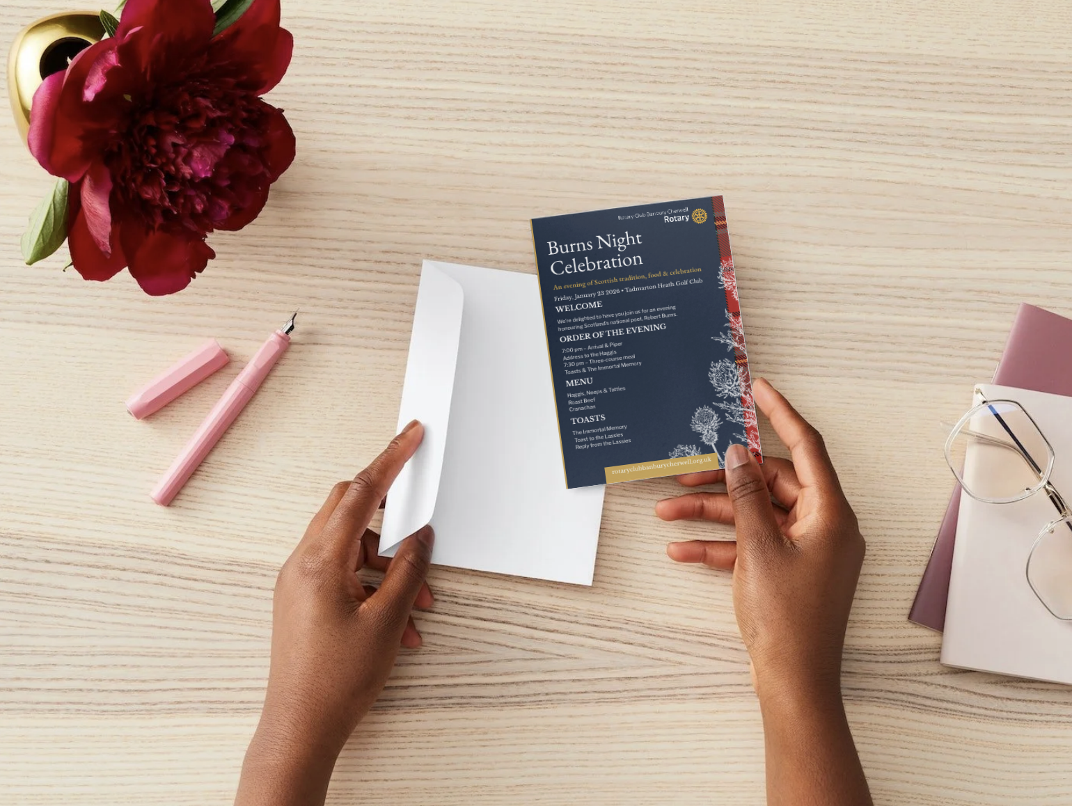 Printed event invitation with matching envelope